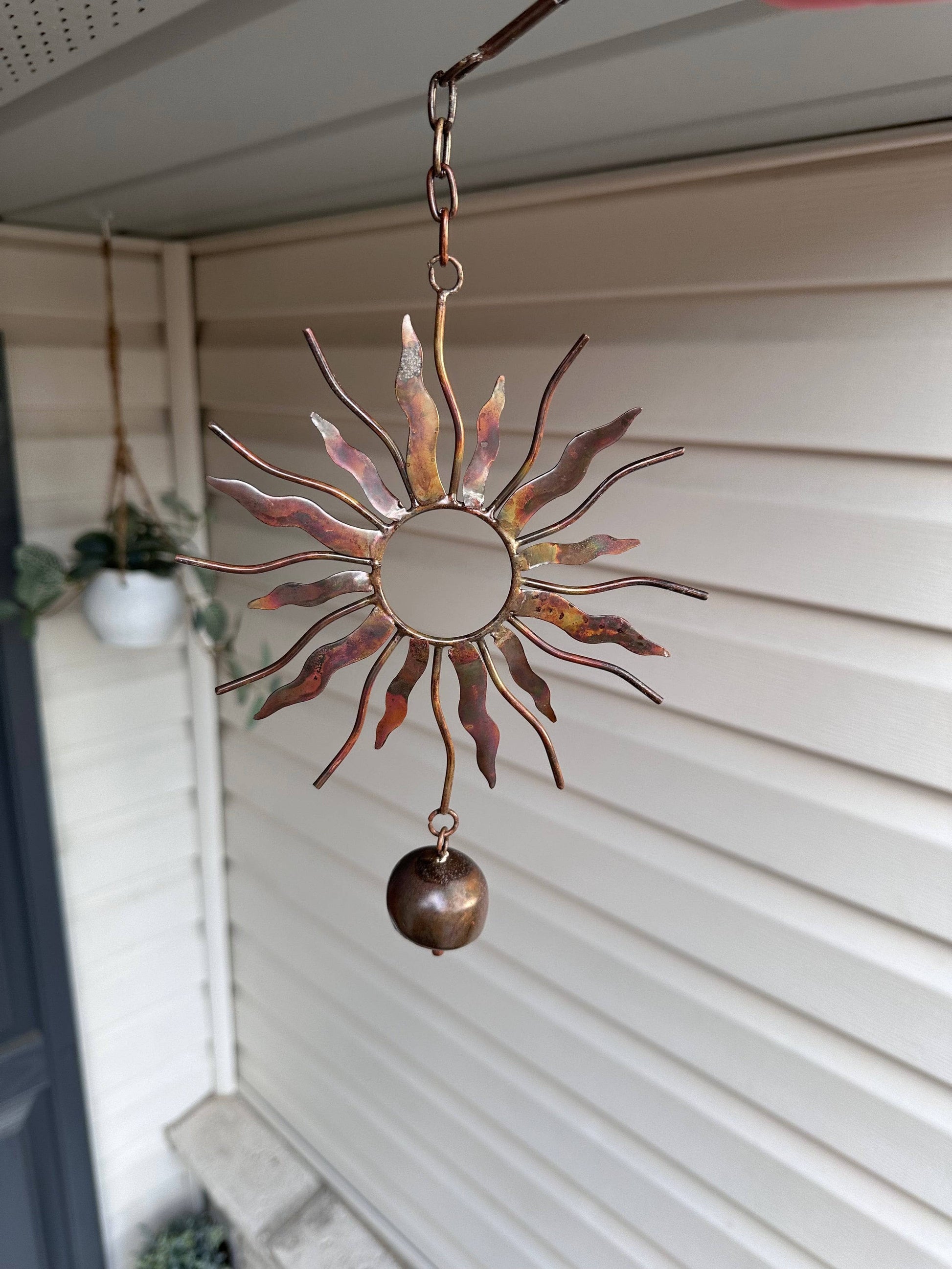 Sun With Bell Hanging Ornament